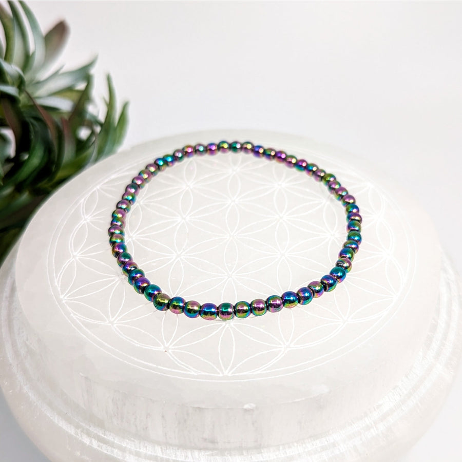 Iridescent beaded bracelet in rainbow colors with hematite 4mm beads, 7 inches long