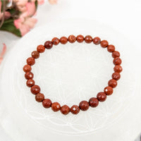 Red Jasper Beaded Bracelet with Faceted 6mm Stones on a 7-inch stretch