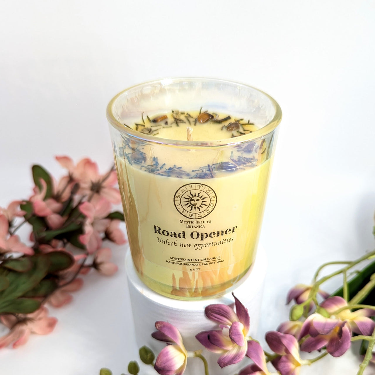 Road Opener Scented Intention Soy Candle in glass with crystals and flowers