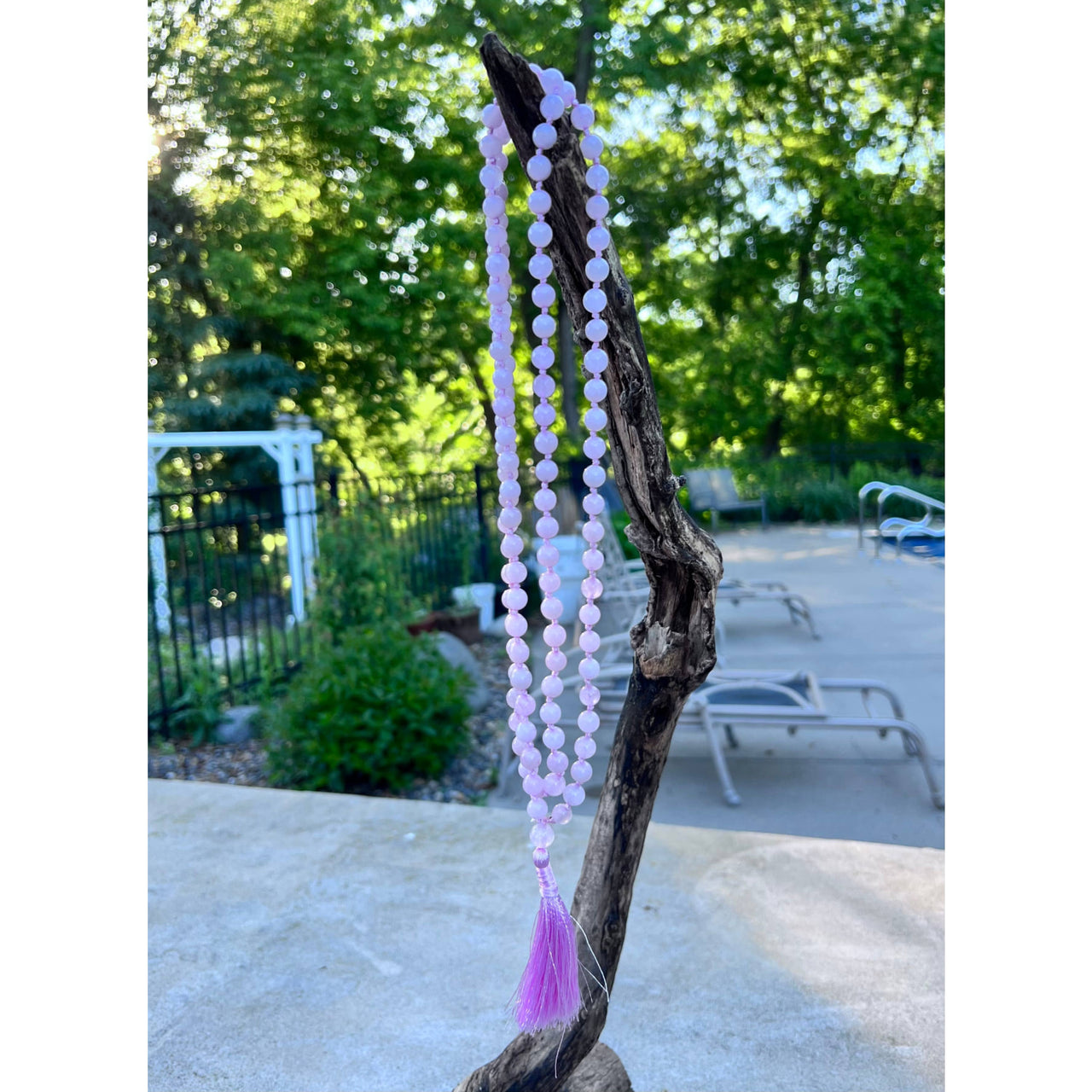 Lavender beaded mala necklace with tassel from Rose Quartz Hand Knotted Mala collection