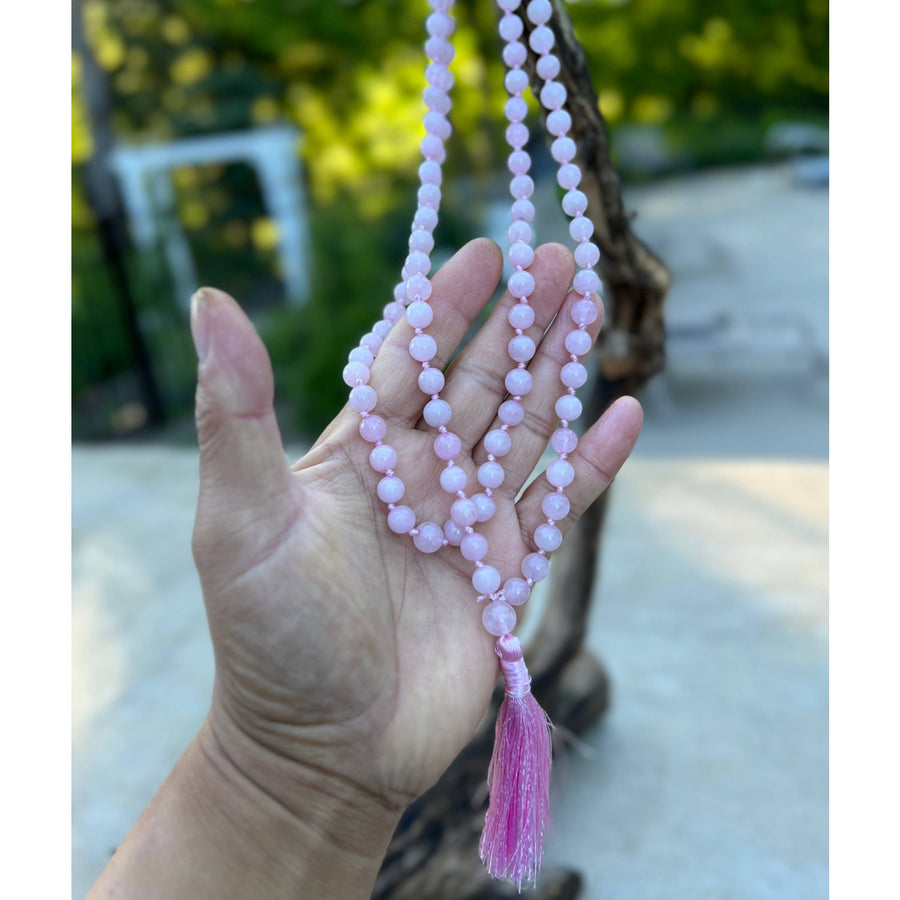 Pink beaded Mala necklace with tassel from Rose Quartz Hand Knotted Mala product