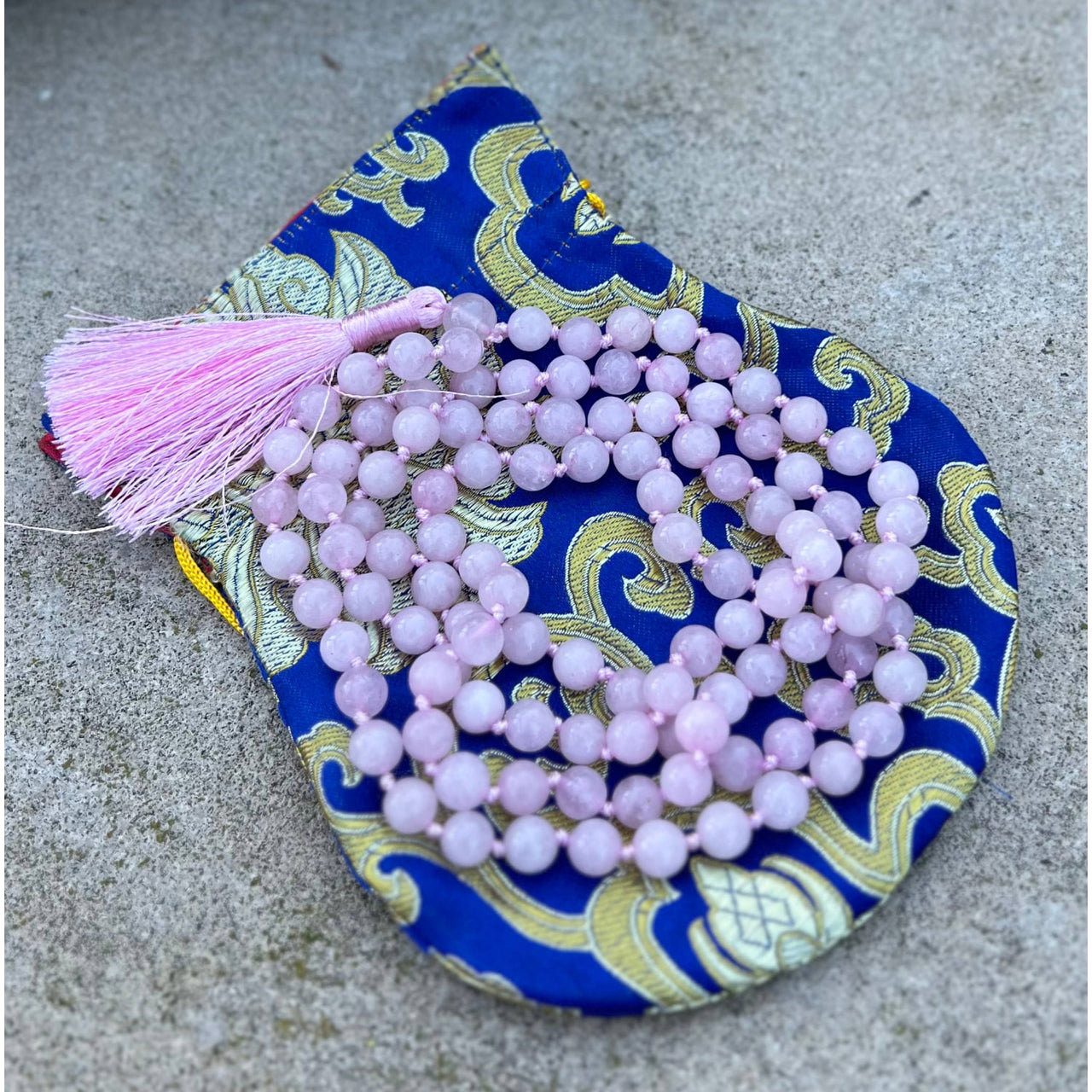 Pink beaded Mala necklace with tassel from Rose Quartz Hand Knotted Mala Rosary 108 Beads
