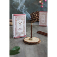 Burning incense stick from Saffron-Sandalwood Musk Tuberose Combo Pack Dhoop Sticks