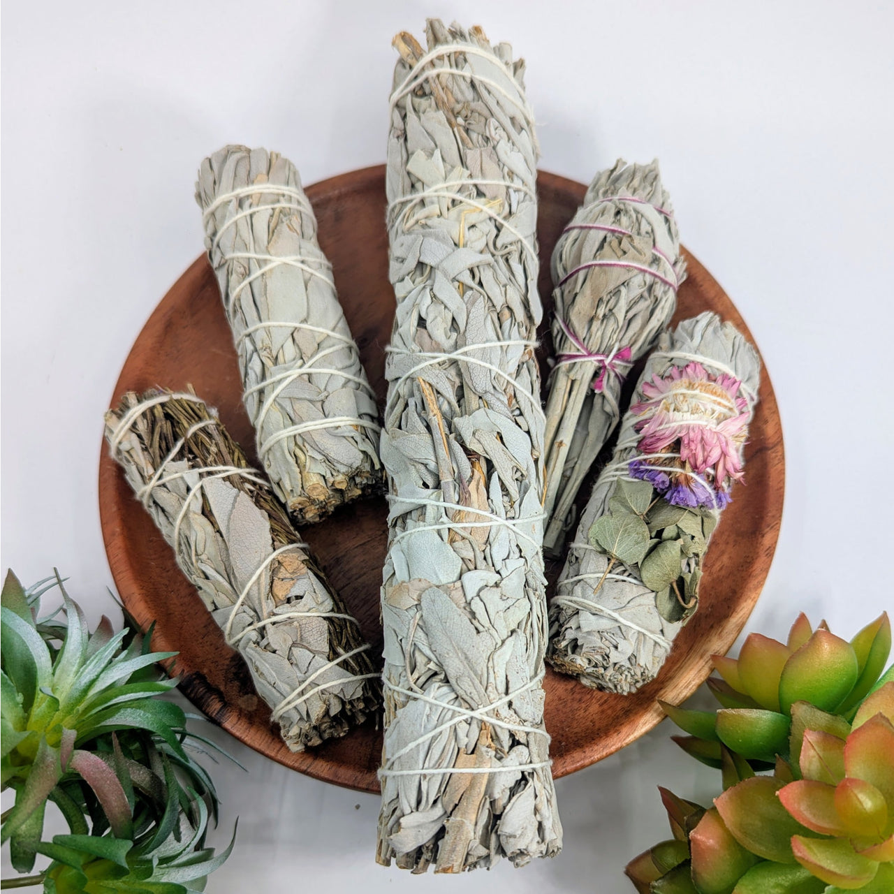 Bundled Sage and Herb Cleansing Smudge Stick for spiritual purification and relaxation