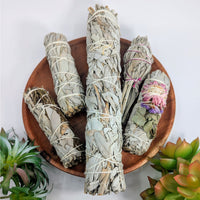 Bundled Sage and Herb Cleansing Smudge Stick for spiritual purification and relaxation