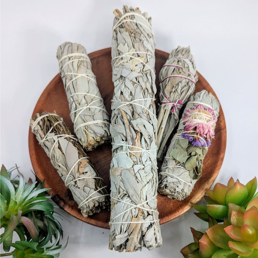 Bundled Sage and Herb Cleansing Smudge Stick for spiritual purification and relaxation
