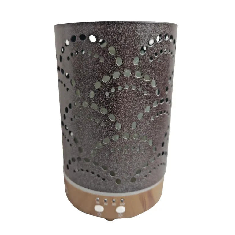 Serene House ultrasonic diffuser with heart cutouts on wood base