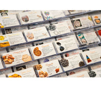 Clear plastic display cases holding a set of 210 double sided crystal zodiac chakra usage information cards in bulk