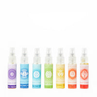 Seven Chakra Spray Set 10ml with colorful bottles and chakra symbols in rainbow order