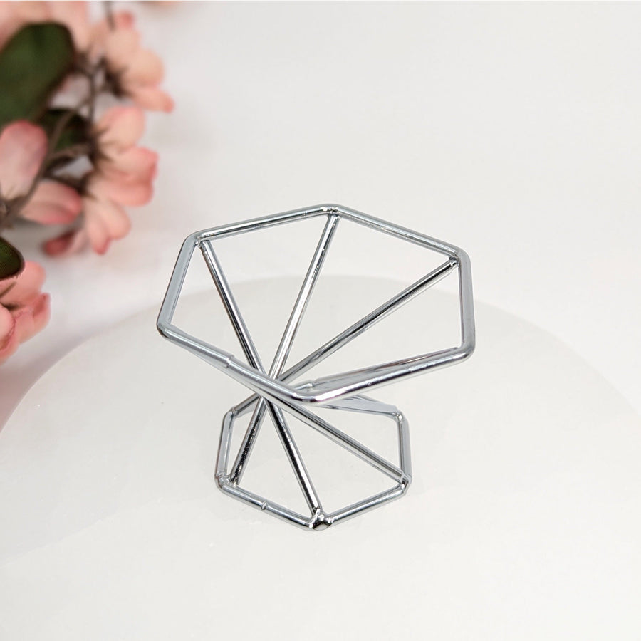 Silver Swirl 1.5-inch Sphere Stand showcasing a geometric chrome soap dish with a sphere stand