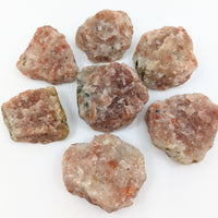 Sunstone 2’’ Rough Stone (73g) #SK9215 resembling a pile of raw meat meatballs
