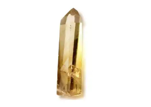 Yellow-tinted crystal point with a hexagonal shape and translucent appearance.