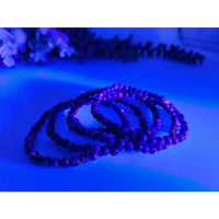 Purple beaded Yooperlite stretch bracelet set, 4mm UV reactive glossy finish LV9544