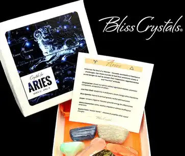 Zodiac-themed Aries card displayed alongside crystals and an informational note from Bliss Crystals.